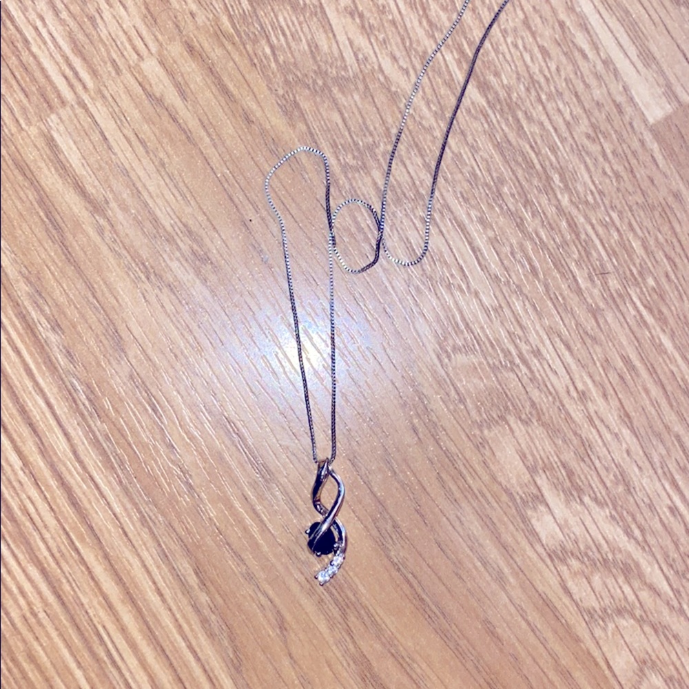 Sterling silver necklace w/ sapphire birthstone.